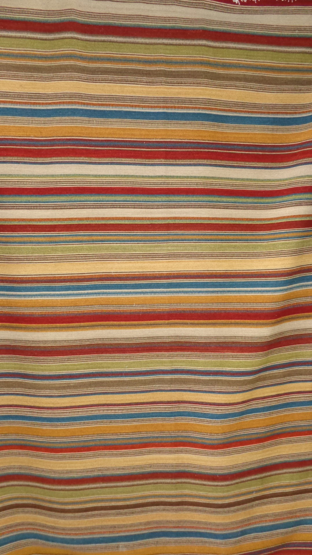 alfombra tejida lana